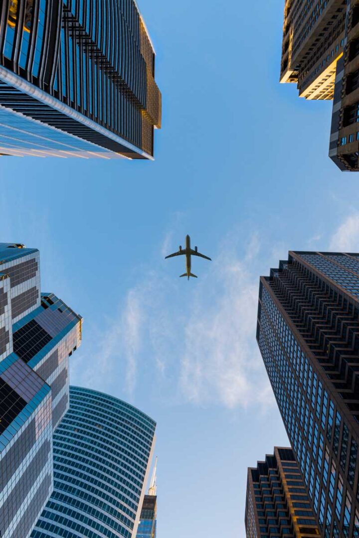 Airplane Flying iPhone Wallpaper 4K City Skyline